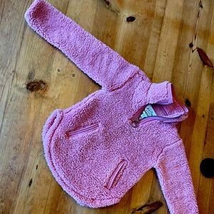 Cuddly Sherpa, zip up pull over with pockets.